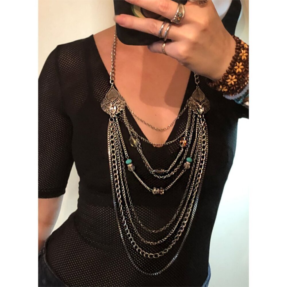 Multi layer chain and crystal bead statement style necklace.